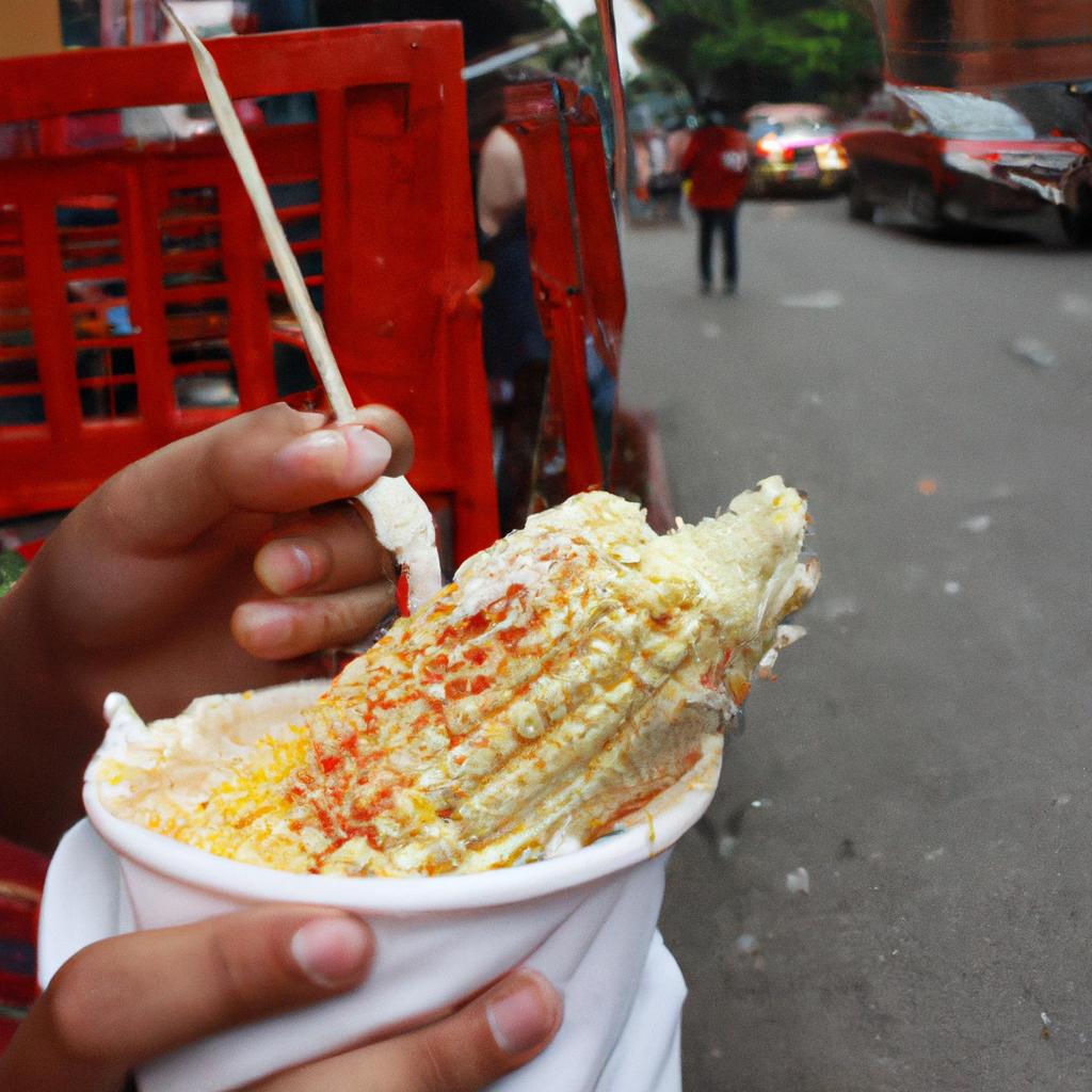 Person eating elote on street